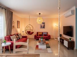 The 2BDR Compelling Condo 5 min to CAI Airport，位于开罗的酒店