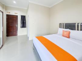 Sans Hotel Bliss Pekanbaru，位于Sultan Syarif Kasim II International Airport北干巴鲁机场 - PKU附近的酒店