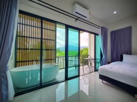Sawaddee Pua Homestay(Cozy Home)，位于浦阿的带热水浴缸的酒店