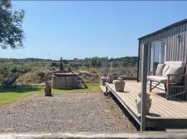 Plumstone view hot tub lodge in Pembrokeshire
