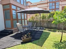 Apartamento con jardín