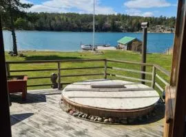 Villa Västanro Skärgårdsstuga på egen ö med båtskjuts