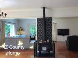 Serene Whangarei lifestyle luxurious modern home with trees and Garden Views