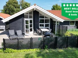 Moderne sommerhus, 8 senge, 250 mtr til sandstrand，位于斯劳厄尔瑟的酒店