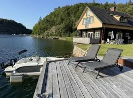 Log cabin with pool, sauna and boat by Torreby Castle