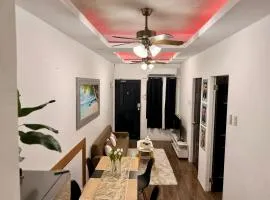 Santa Cosy Villa suite-B Fast Wi-Fi, Netflix Included Split system Air-con & Hot Shower Close to Enchanted Kingdom