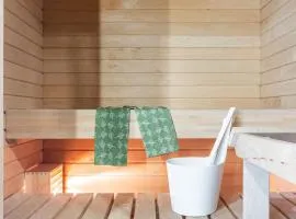 Modern 1BR Home with Sauna & Balcony