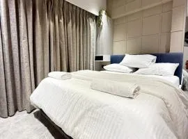 Blossom Exotica Stays in a Luxury Room