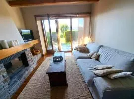 Planta baja con jardín y piscina en Olopte