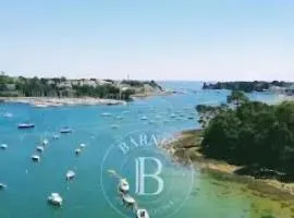 AU PIED DE LA MER AU COEUR DE LA STATION bel appartement contemporain