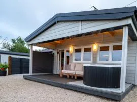 Luxury Log Cabin with Private Hot Tub & Sea Views
