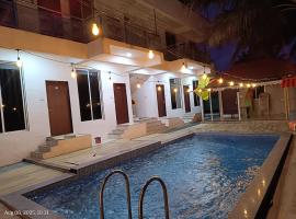 Parvi's Konkan Bliss Resort，位于阿利鲍格的酒店