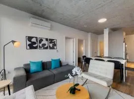 Chic 4-Bedroom with Skyline Views & Amenities