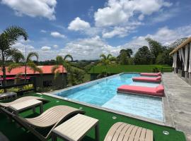 Eco Hotel La Colina Mirador Con aire acondicionado，位于金巴亚的酒店