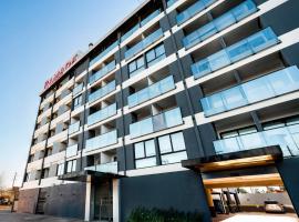 Ramada Suites by Wyndham Asuncion Aeropuerto，位于亚松森的低价酒店