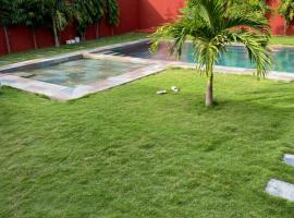 Appartement Piscine Jardin，位于恩加帕鲁的酒店