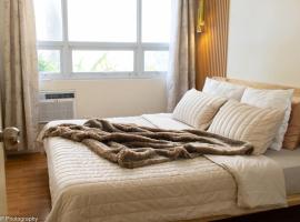 Seawind Condominium Near Airport，位于达沃市的带热水浴缸的酒店