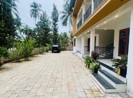 CT HOMESTAY, Omassery，位于Tāzhekkod的酒店