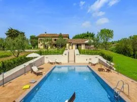 Inviting Holiday Home in San Costanzo with Swimming Pool