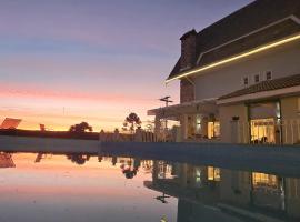 Pousada Villa Dolce Amore - Boutique Hotel，位于坎波斯杜若尔当的酒店