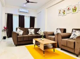 Palm View 1BHK with Pool & Café - Sazo Stays