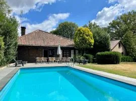 Farmhouse in Sint Joost with Pool & BBQ