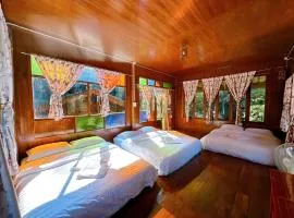 บ้านเอื้องดอยแม่กำปอง
