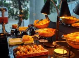 Paraíso Suítes by Charlie