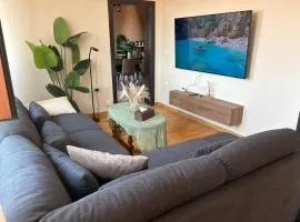 Relax & Sunshine - Modern 2BR Apartment, 100m2, nature view, 30 min from San Teodoro - Ideal for families, groups & Smartworkers