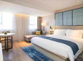 Echarm Hotel Shenzhen World Exhibition and Convention Center，位于Shenzhen的酒店