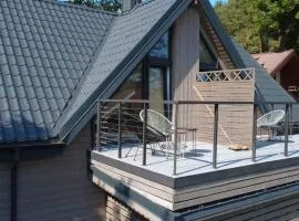 Rytas cozy apartment in the guest house with the terrace and the stunning view to the river side