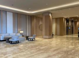 Cozzy Studio at Tokyo Riverside，位于Muara的酒店