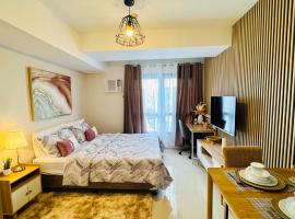 J Tower Residences，位于曼达维市的酒店