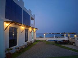 Wadi shab guest house，位于Ţīwī的酒店