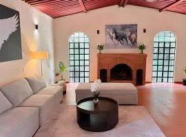 Suite entre árboles y fogata