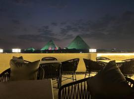 The kings pyramids & sphinx view hotel，位于开罗的酒店