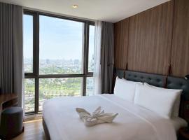 Oakwood Suites Tiwanon Bangkok，位于暖武里府的酒店