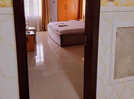 International royal hotel，位于奥韦里的酒店