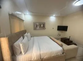 Sardonyx Studio Apartment - Modern Compact Living