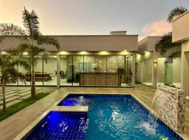 CASA ARUANÃ 5 SUITES，位于阿鲁阿南的酒店