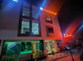 Hotel Sai Dakshina Inn & The Fern Restaurant，位于舍地的酒店
