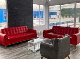 Hotel residencial bella vista，位于莫科阿的带停车场的酒店