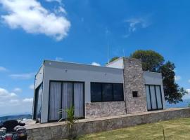 Casa de Vidro na Montanha，位于坎布伊的酒店