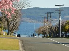 Happiness is Huia a block from the lake