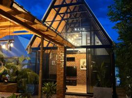 Chalet casa colibr&iacute;，位于梅尔加的别墅