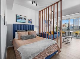 Airport and Volcano Views from 11th Floor Apartment，位于危地马拉的带停车场的酒店