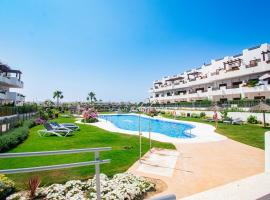 Modern 2BR Apt with own Terrace & Pool access，位于普尔皮的酒店