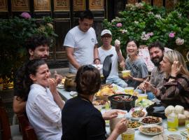 Yiyuan Snow Mountain View Naxi Style Inn- Lijiang Old Town Mufu branch，位于丽江的酒店