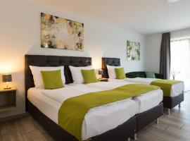 GLEUEL INN - digital hotel & serviced apartments & boardinghouse mit voll ausgestatteten Küchen，位于许尔特的酒店