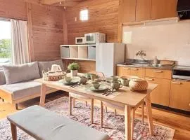 Amakusa Log House with Sea and Sunset View